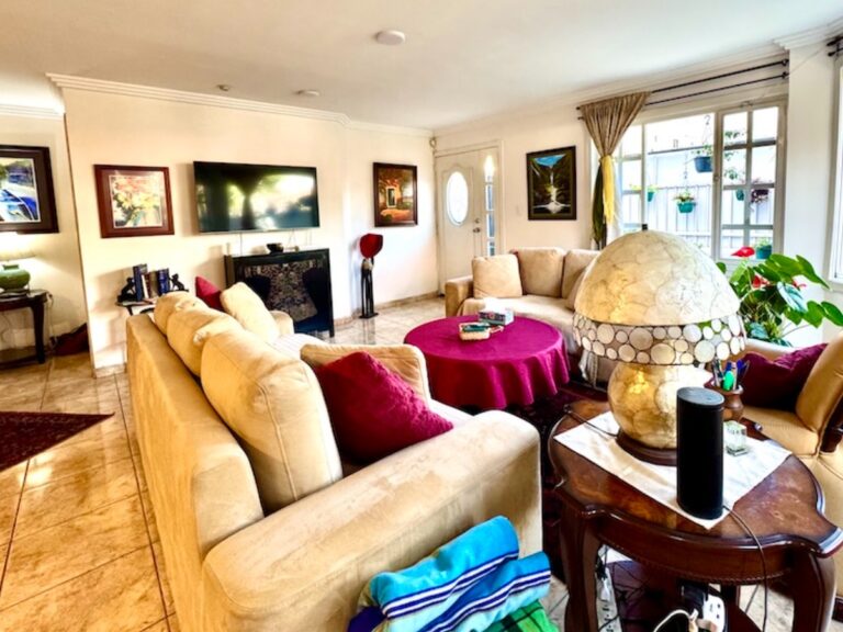 WARM, LIGHT-FILLED, 3-BEDROOM HOME WITH GARDEN AND ARCHITECTURAL CHARM IN DESIRED PUERTAS DEL SOL